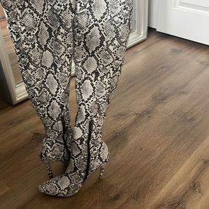 Knee high snake boots